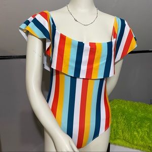 Darling multi colored one piece that can be worn off shoulder or on